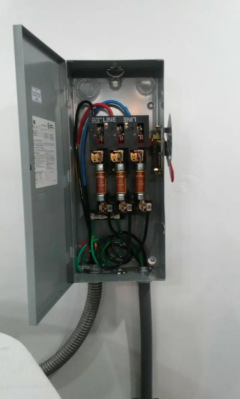 Three-phase disconnect switch installed for Smoke Detector Installation in Carrollton
