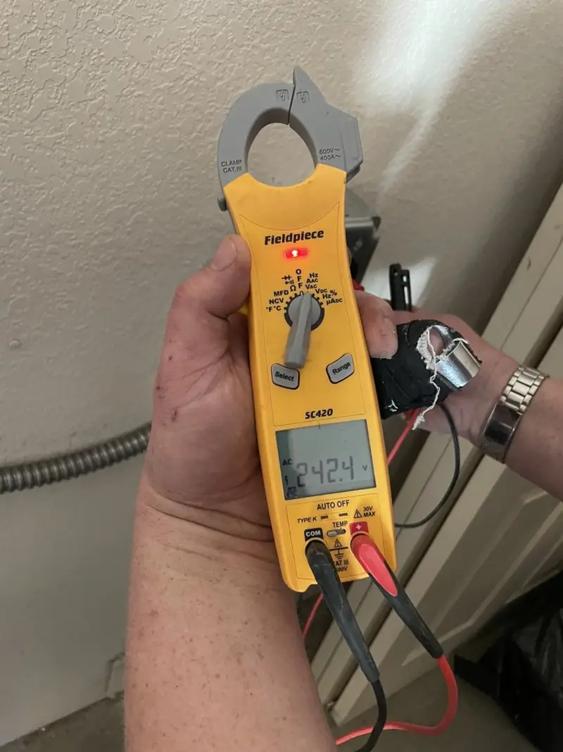 Voltage testing with clamp meter during Generator Installation in Carrollton